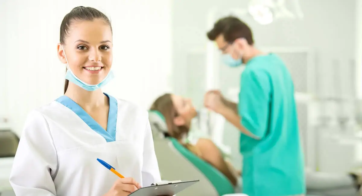 Young woman smilling in the dental office