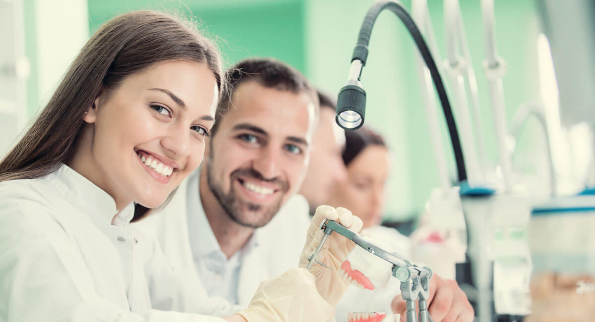 a woman in dental office smiling
